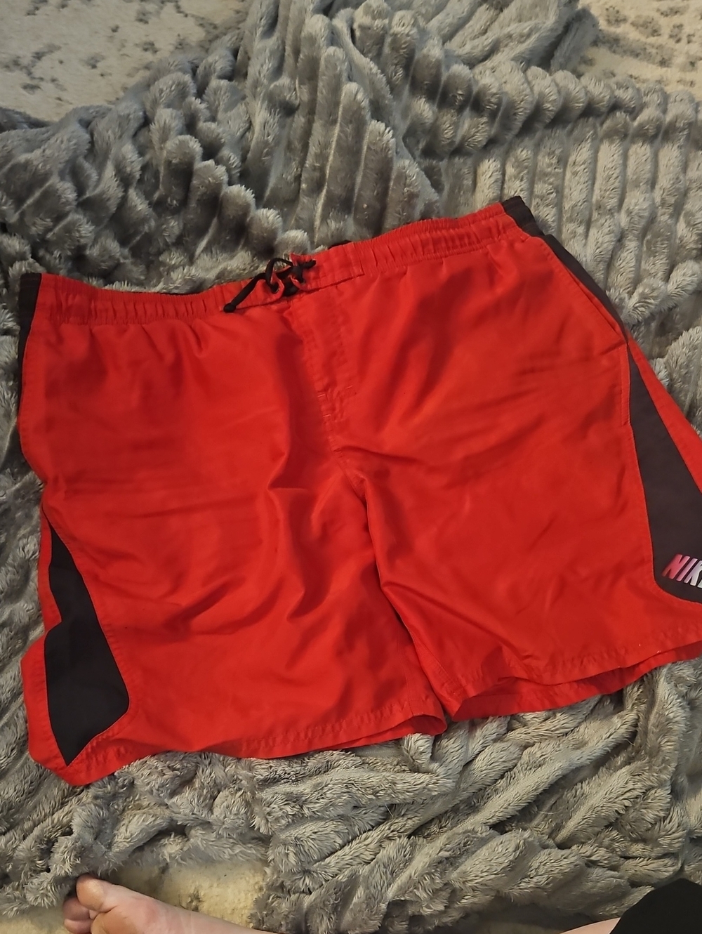 Nike Men's Red Swim Trunks with Black Side Panels